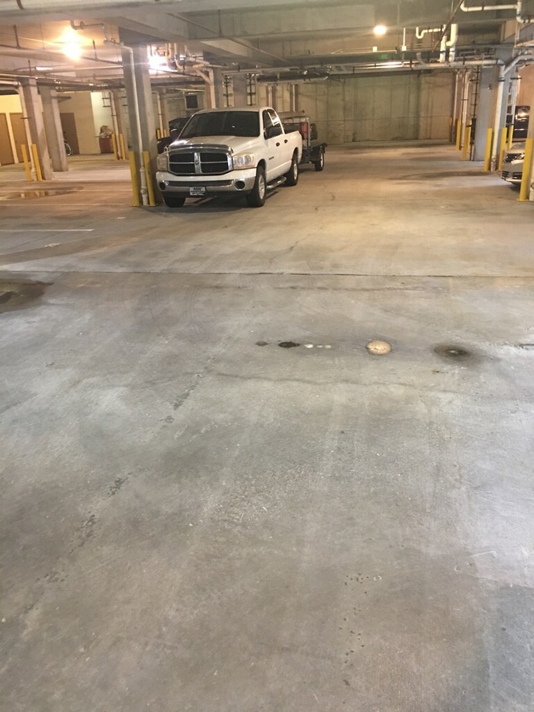 Pressure washing parking garage decks in Atlanta
